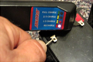 Ice fishing pro Joe Devera demonstrates using a battery charger to keep his ice fishing gear batteries ready for ice fishing season.