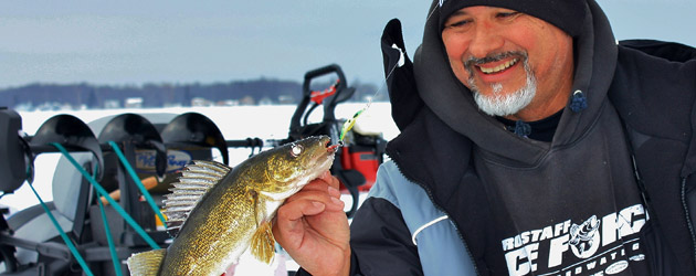 Mike Schneider, Mark Martin Pro-staffer shows off a typical Houghton Lake walleye