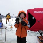 A happy young ice angler with a big crappie caught during the K&E Tackle ice fishing get together