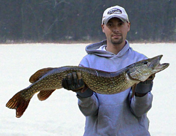 Ryan Buchanan with his fifteen pound ice fishing pike. Credit: Jack Payne