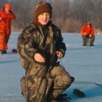 Young Angler With Panfish caught while ice fishing