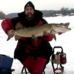 Keith Stanton with a big ice fishing muskie