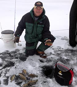 Local ice fishing guru and Team Stopper pro staff member Bill Ferris shows a nice mess of ice fishing panfish.