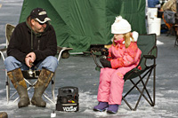 Michigan winter free fishing weekend fun for ice fishing families. Photo credit: Dave Kenyon, Michigan Department of Natural Resources