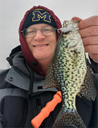 A respectable Lake Lansing crappie caught on a small jigging Shad Rap from the same hole I saw a big pike on video