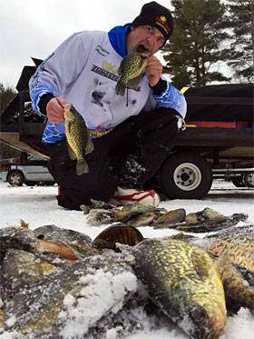 Ray Tiffany shows off a mess of metallic caught panfish