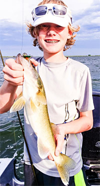 Cody Caraway with a Yukon Minnow caught South Dakota walleye